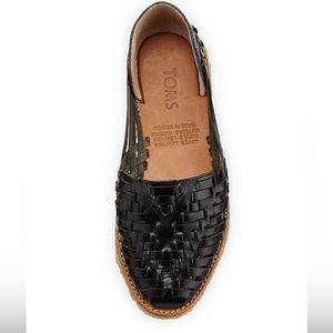 TOMS black leather hirache slip on shoes